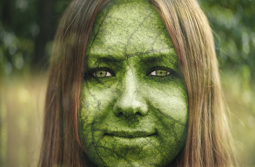 Portrait of woman combined with grean leaf