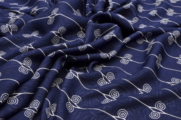 Silk with white ornaments on dark blue