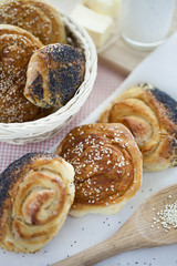 hot cross buns with poppy seeds and seasame