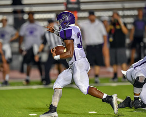 Football player making an amazing play during a game