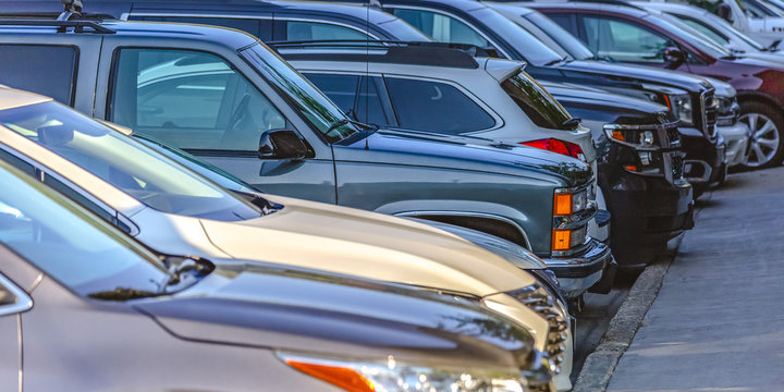 Line Of Cars Parked In Park City