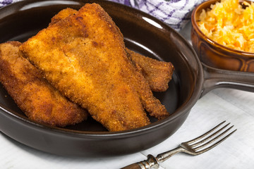 Pieces of cod in breadcrumbs.