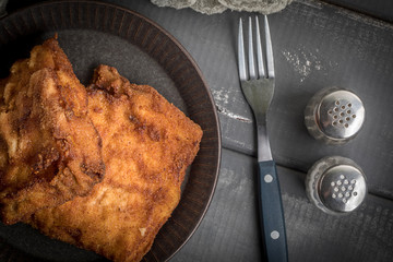Two fried cod fillet pieces.