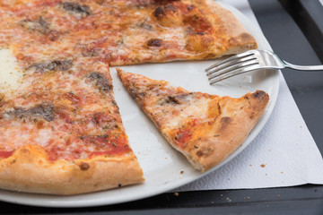Tasty Italian pizza with anchovies