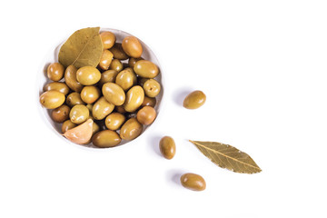  paprika, laurel and pepper Olives on isolated pure white background ready to be consumed.