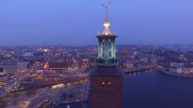 Stockholm City Hall by evening. Drone view descending.