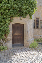 Fototapeta na wymiar Old, wooden entrance door.