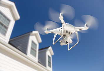 Drone Quadcopter Flying, Inspecting and Photographing House
