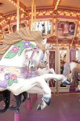 Closed up of vintage horse carousel or merry go round (merry-go-round) with selective focus  © enchanted_fairy