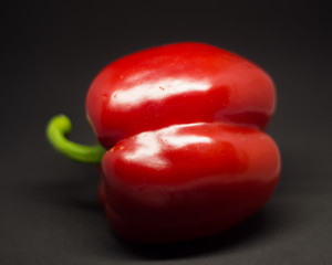 red pepper paprika on a black background