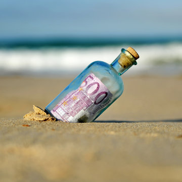 Tax haven concept, five hundred euros in a bottle