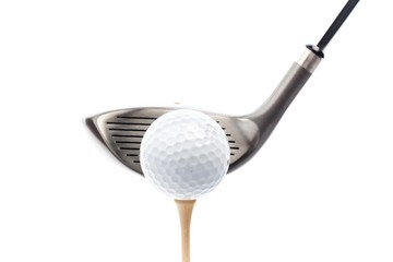 Closeup of Golf Club and Golf Ball on Tee