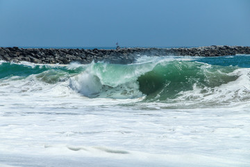 Large wave crashing at The Wedge in Newport Beach