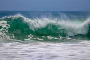 Large wave crashing at The Wedge in Newport Beach