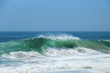 Large wave crashing at The Wedge in Newport Beach