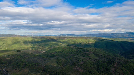 Naklejka premium Landscape of wind turbines in the mountains