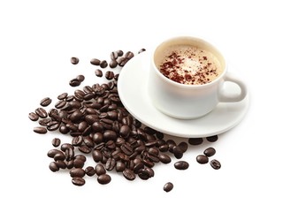 Cup of coffee surrounded by coffee beans