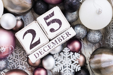 Christmas decorations and wooden blocks with 25 December Date