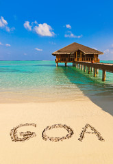 Word Goa on beach