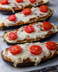 healthy bulgur stuffed eggplant with cherry tomatoes and cheese