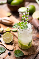 Caipirinha cocktail on wooden table