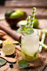 Caipirinha cocktail on wooden table