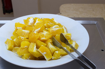 slices of oranges on a large plate