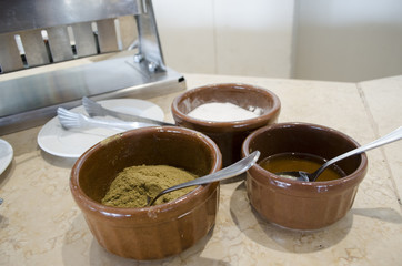 different spices in plates