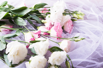 Romance day. Lisianthus, eustoma flowers with veil.