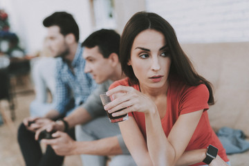 Young People Playing Videogames on Party at Home.