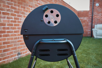 Black barrel grill.