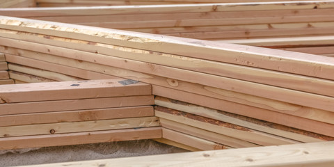 Stacked segments of rooftop construction wide