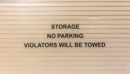 Storage garage with text on doors close up