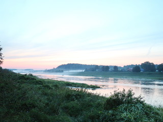 picturesque river bank at sunset