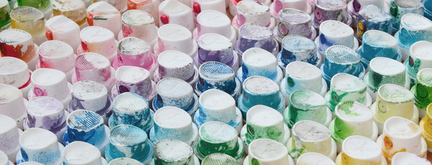 A pattern from a many nozzles from a paint sprayer for drawing graffiti, smeared into different...