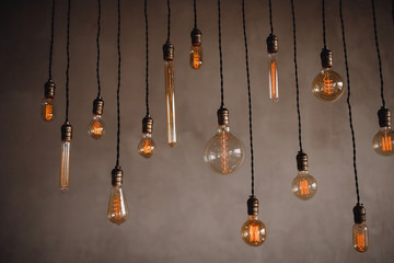 Set edison retro lamp on loft gray concrete background.
