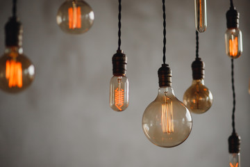 Set edison retro lamp on loft gray concrete background.