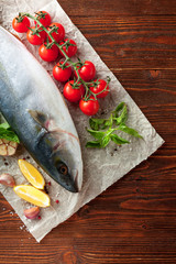 Fresh tuna with tomatoes, oil and spices