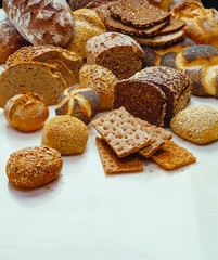 Various breads on white background