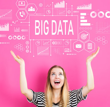 Big Data with young woman reaching and looking upwards