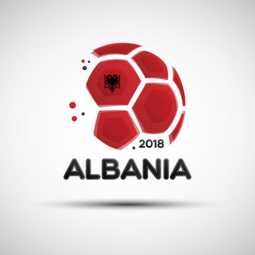 Abstract soccer ball with Albanian national flag colors