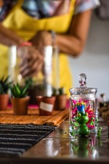 Woman planting terrarium for Christmas
