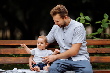 Little boy with his Dad in the park