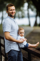 Little boy with his Dad in the park