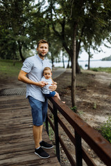 Little boy with his Dad in the park