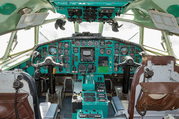 Old russian airplane cockpit interior with analog instruments - light