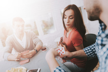 Young Smiling People Have Fun on Party at Home.