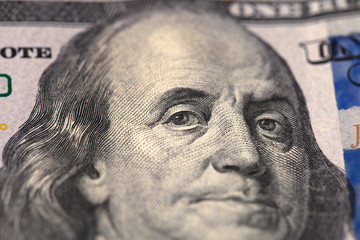 Close up portrait of Franklin on hundred dollar bill
