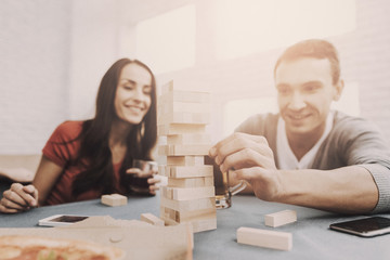 Young Smiling People Have Fun on Party at Home.