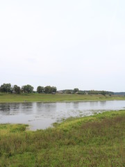 picturesque river bank at sunset